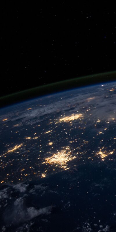Earth from Space at Night — Black, Dramatic, Photograph, City Lights, Clouds, Stars