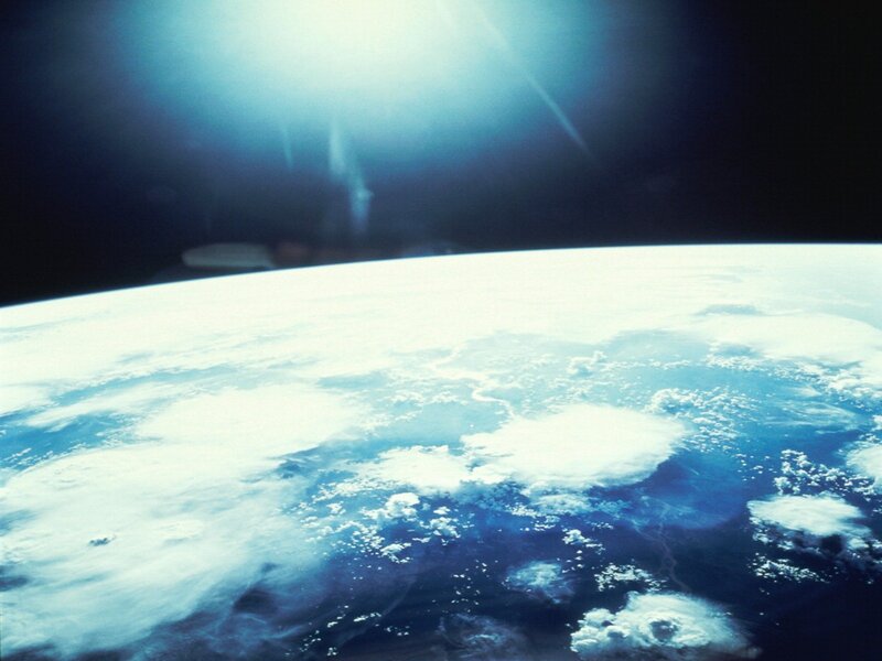 Earth from Space — Blue, Dramatic, Photograph, Clouds, Ocean, Sunlight