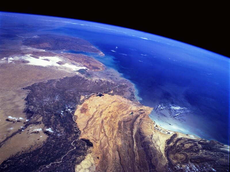 Earth from Space — Blue, Dramatic, Photograph, Ocean, Landmass, Clouds