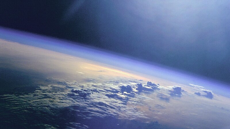 Earth from Space — Blue, Dramatic, Sunrise, Photograph, Clouds, Atmosphere, White