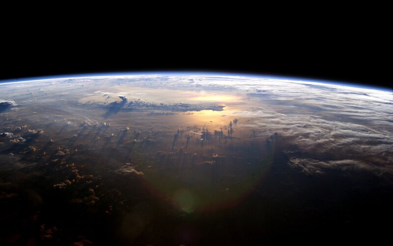 Earth from Space — Blue, Dramatic, Sunrise, Photograph, Clouds, Sunlight, Horizon