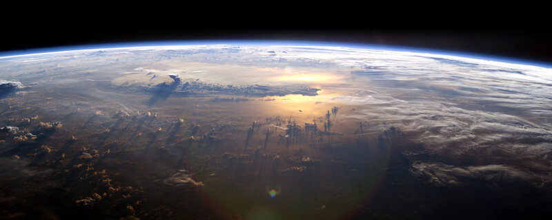 Earth from Space — Blue, Dramatic, Sunrise, Photograph, Clouds, Sunlight