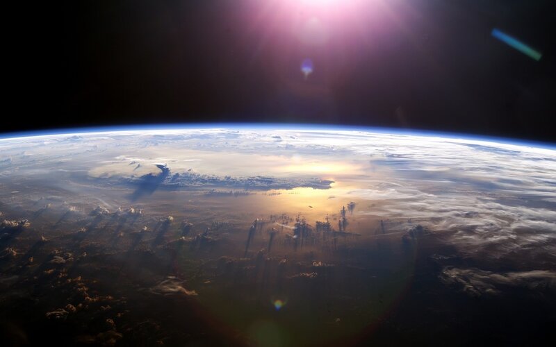 Earth from Space — Blue, Dramatic, Sunrise, Photograph, Sun, Clouds, Horizon