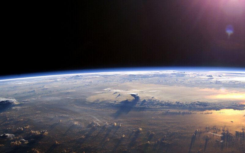 Earth from Space — Blue, Dramatic, Sunset, Photograph, Clouds, Sunlight