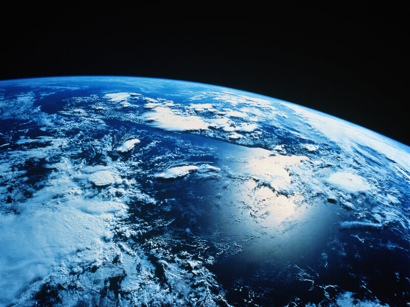 Earth from Space — Blue, Serene, Photograph, Clouds, Ocean, Sunlight