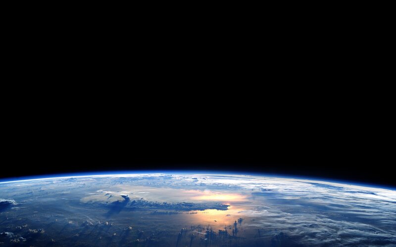 Earth from Space — Blue, Serene, Sunrise, Photograph, Clouds