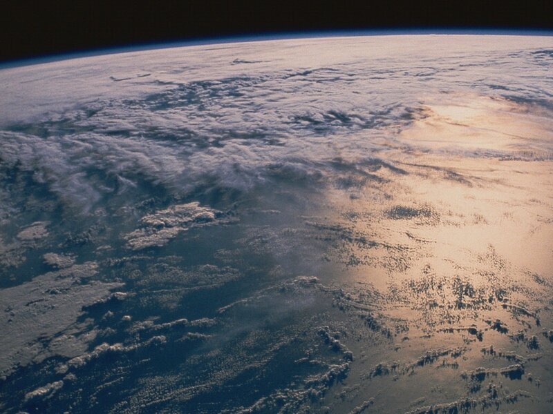 Earth from Space — Blue, Serene, Sunset, Photograph, Clouds, Ocean