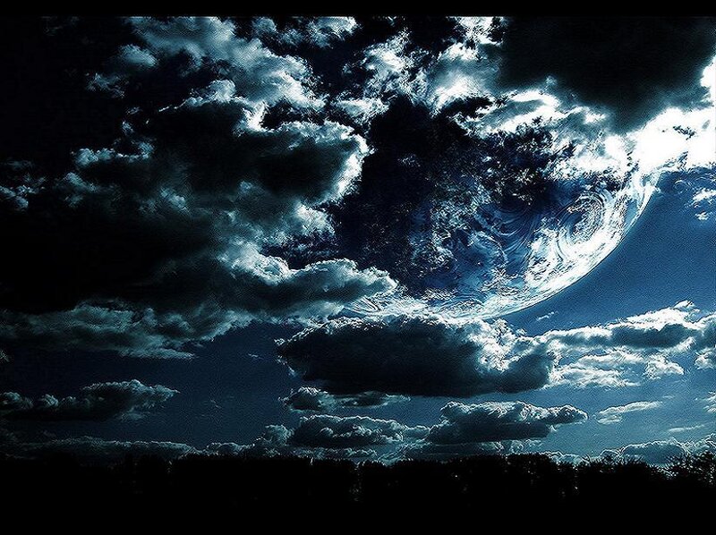 Earth from space through clouds