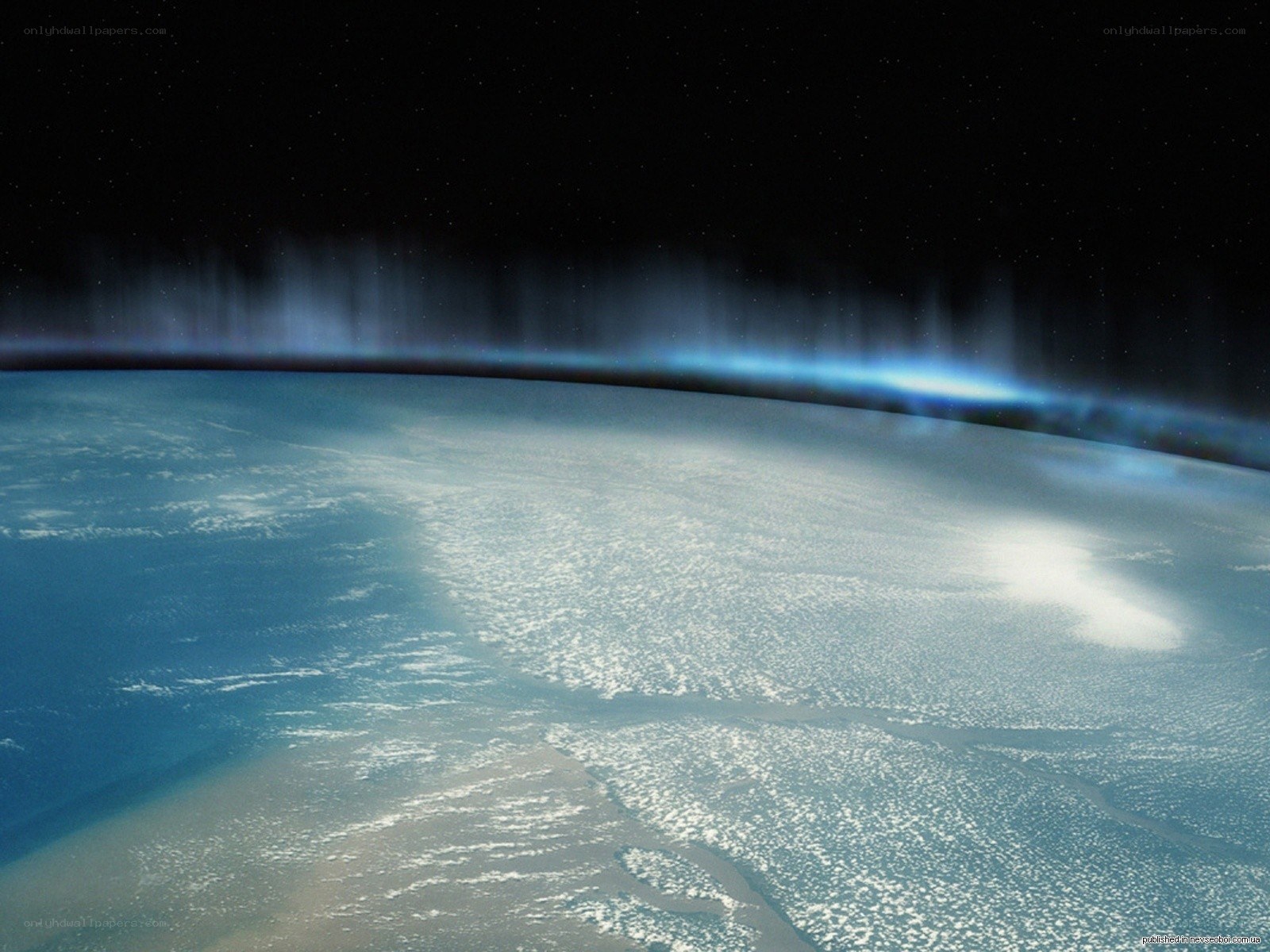 Earth from space with aurora