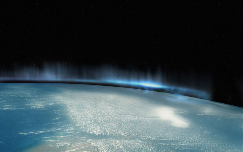 Earth from space with aurora