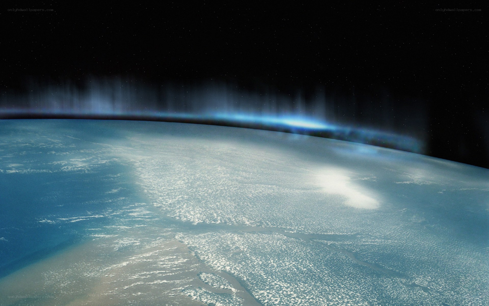 Earth from space with aurora