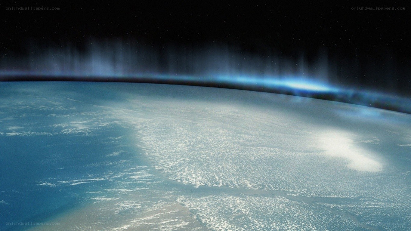 Earth from space with aurora