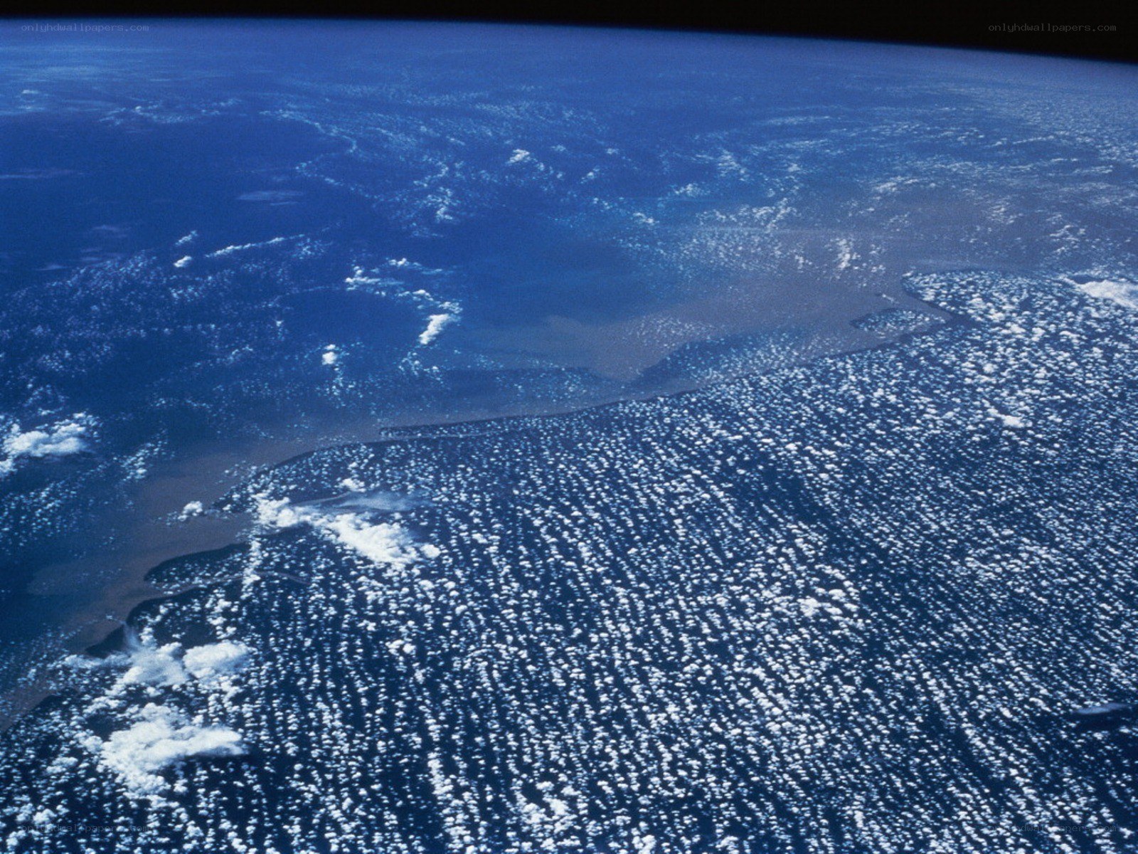 Earth from space with clouds