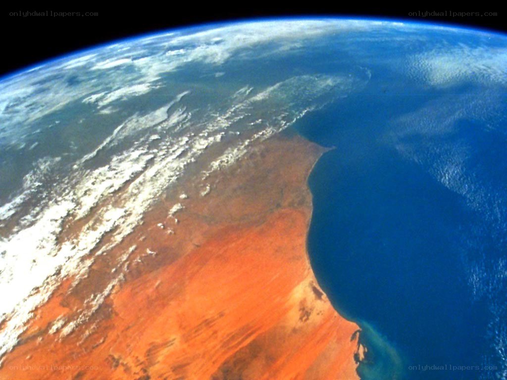 Earth from space with desert coast