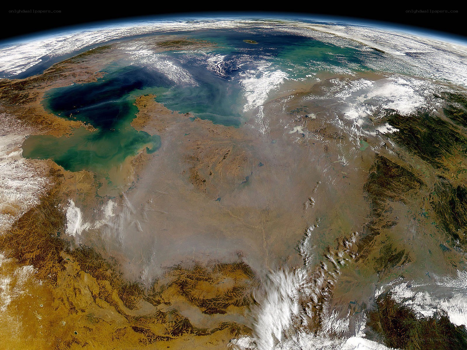 Earth from space with dust storm