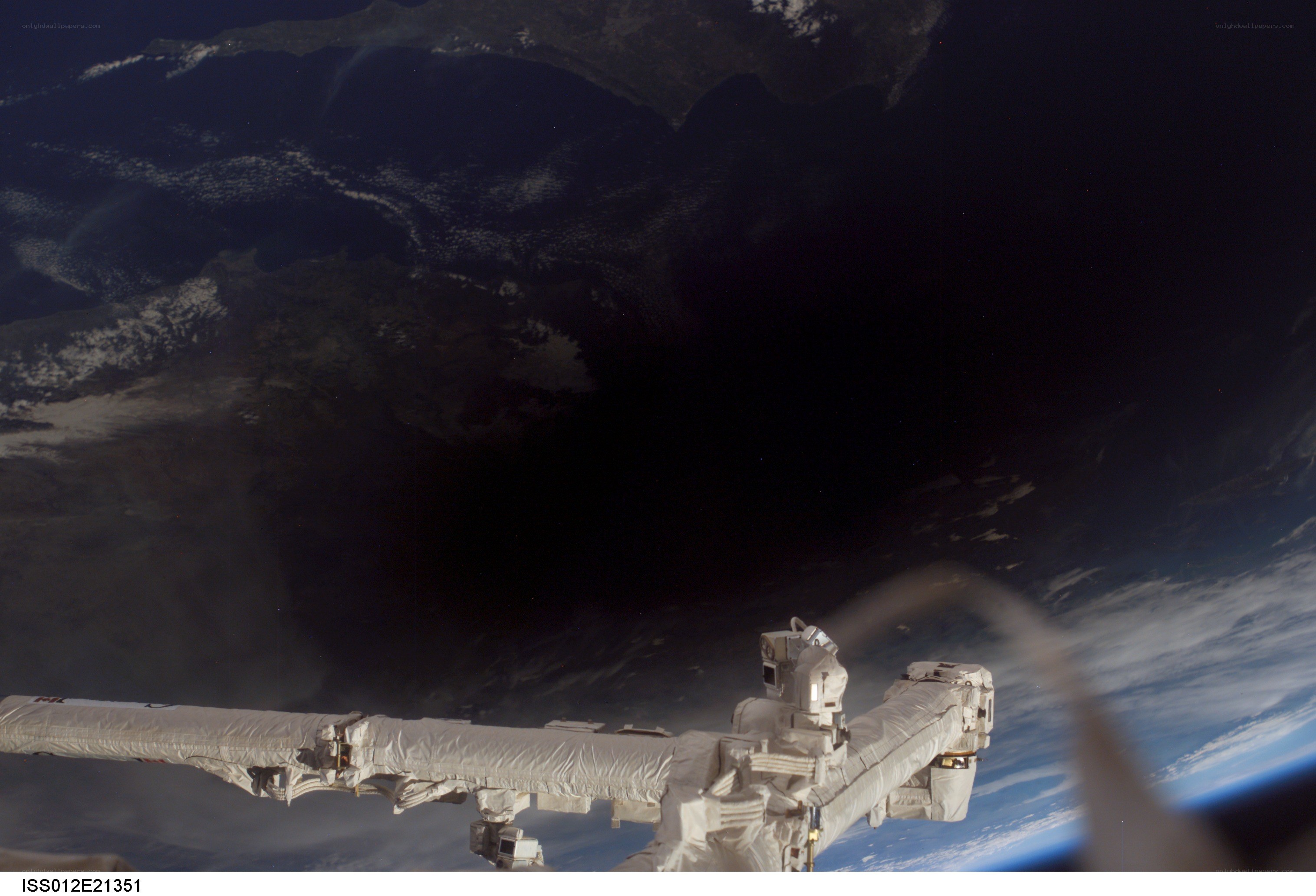 Earth from space with ISS structure