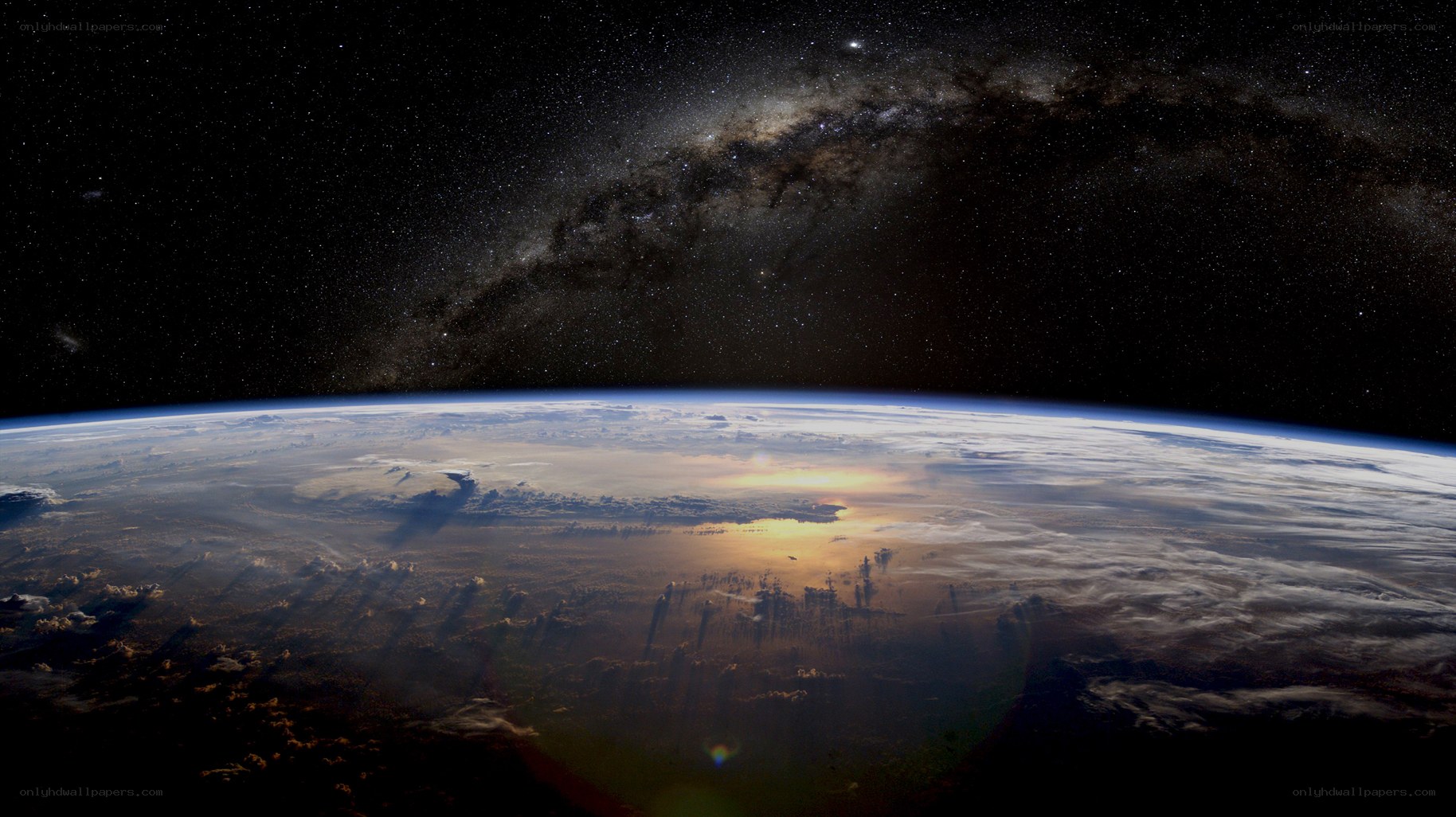 Earth from space with Milky Way