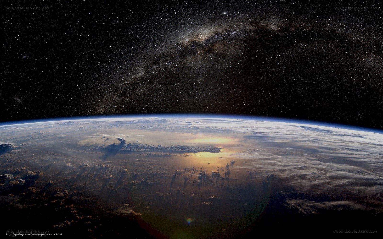 Earth from space with Milky Way