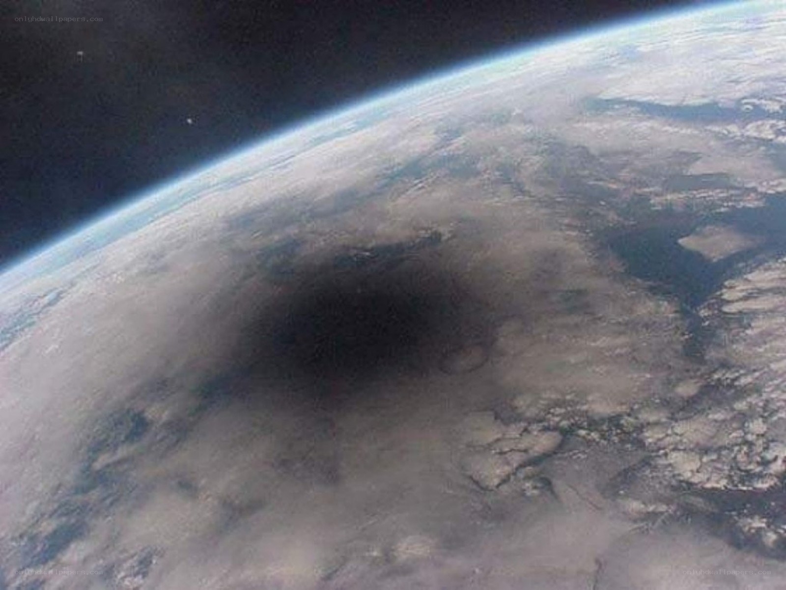 Earth from space with shadow