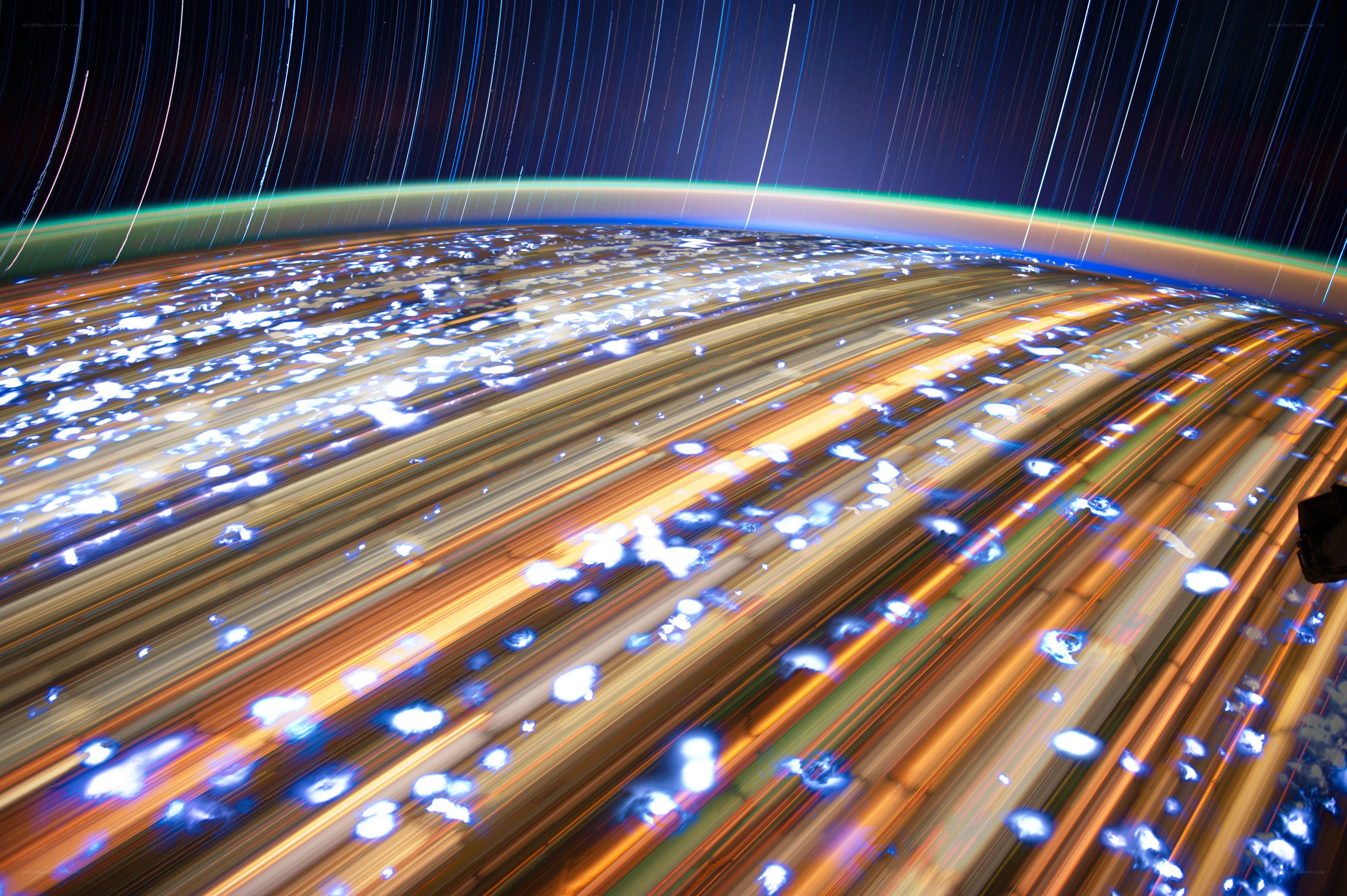 Earth from space with star trails