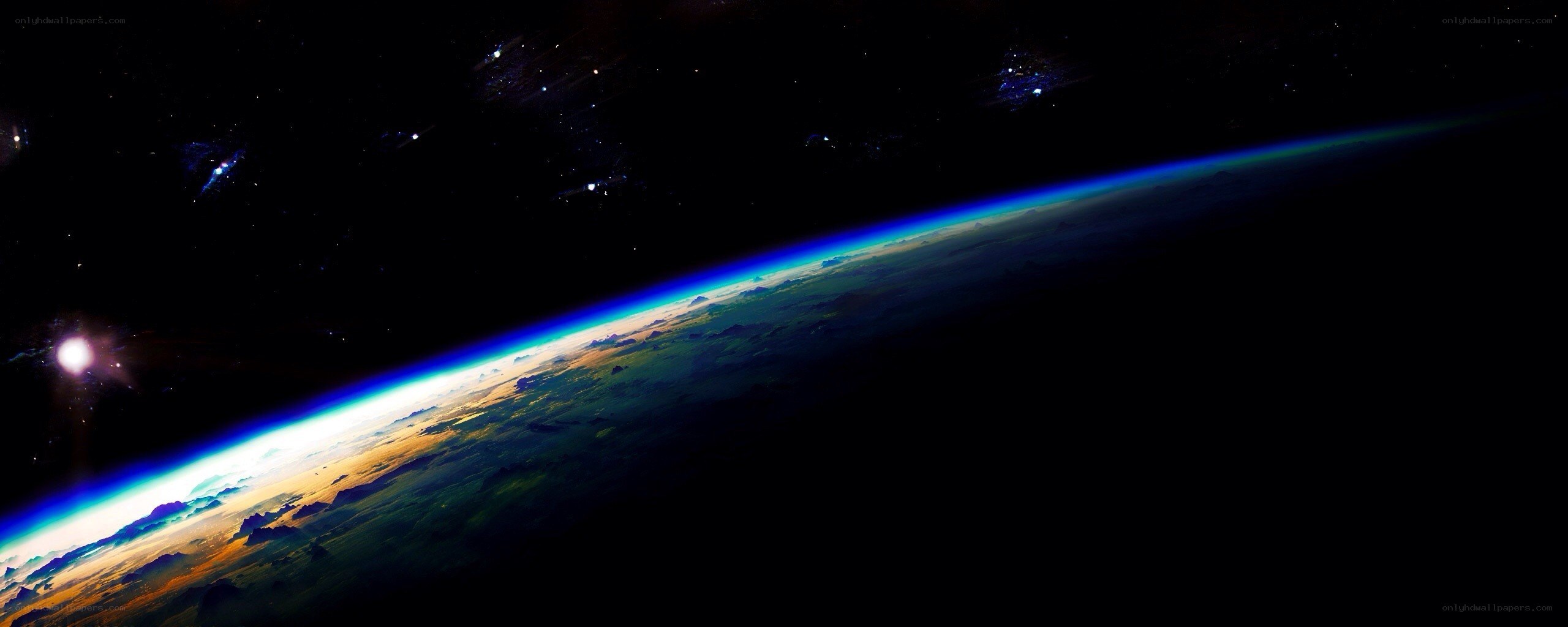Earth from space with sun glare