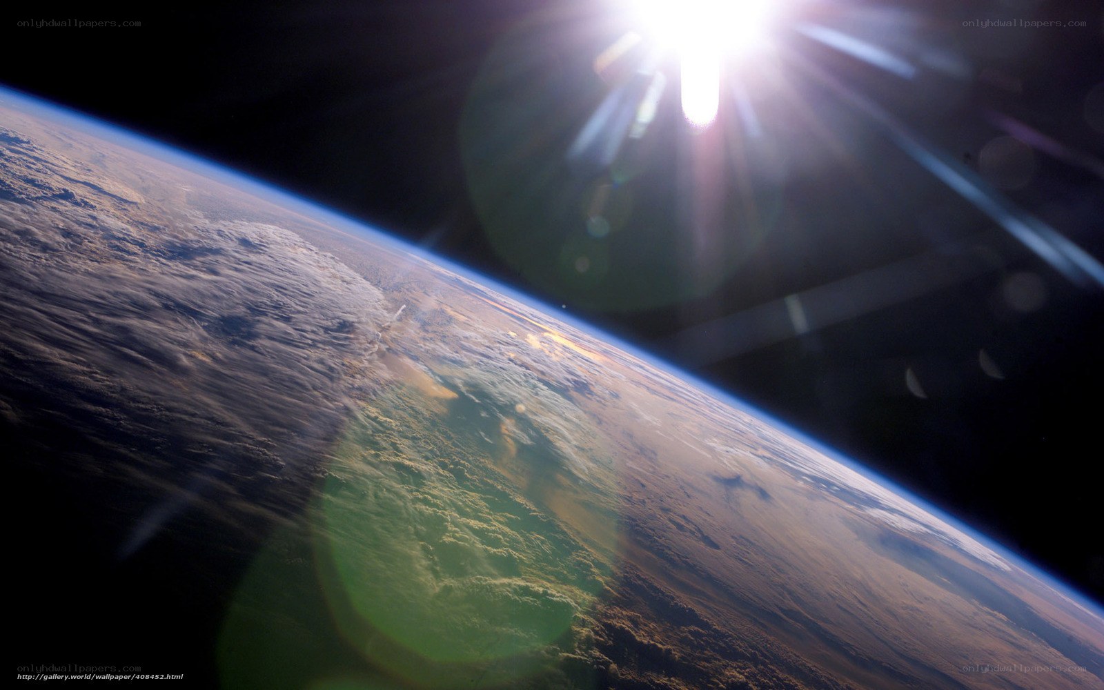 Earth from space with sun glare