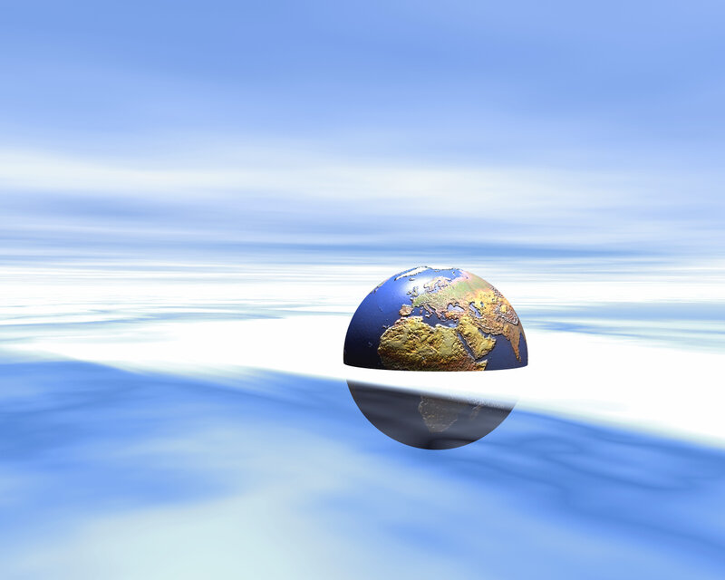 Earth globe over water