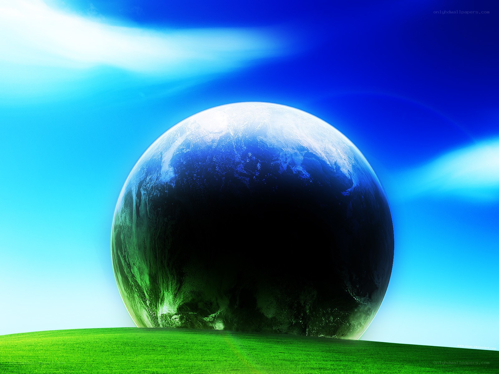 Earth on a green hill