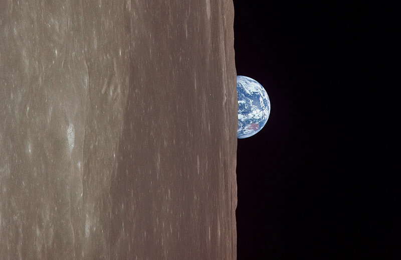 Earth rising over the Moon