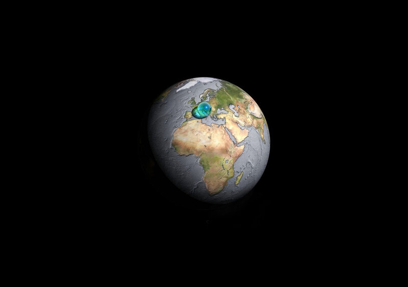 Earth with glowing orb over Europe