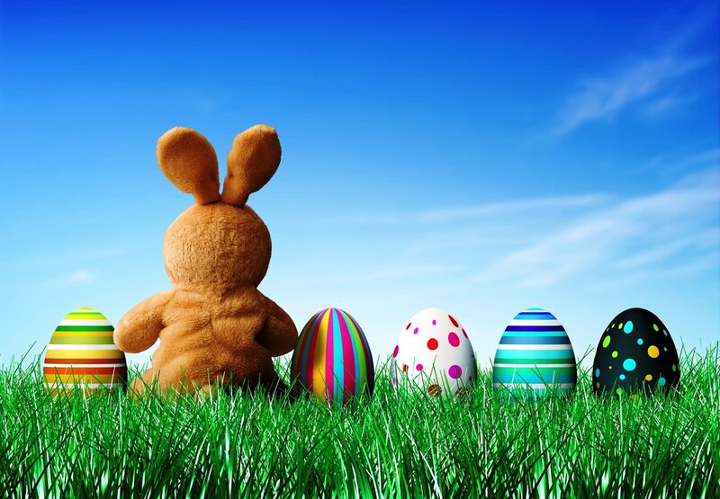 Easter bunny with colorful eggs