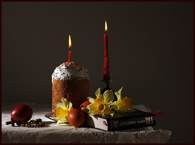 Easter cake with candles and flowers