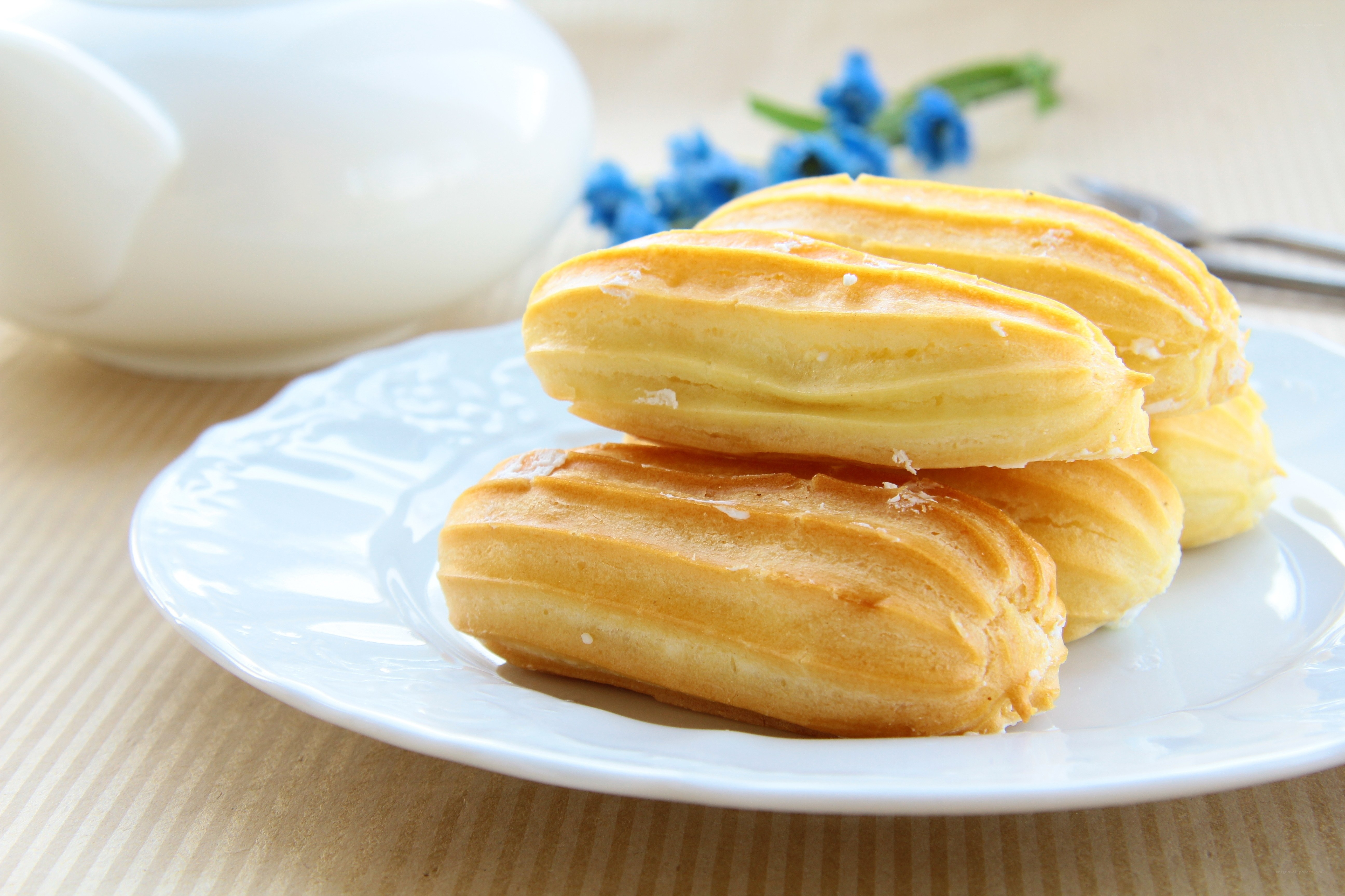 eclairs on a white plate
