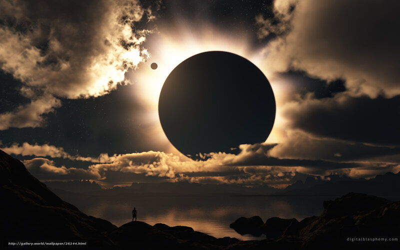 Eclipse over a lone figure