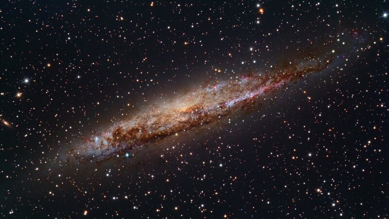 Edge-on spiral galaxy in deep space