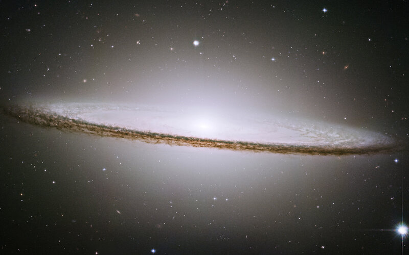 Edge-on Spiral Galaxy — White, Cosmic