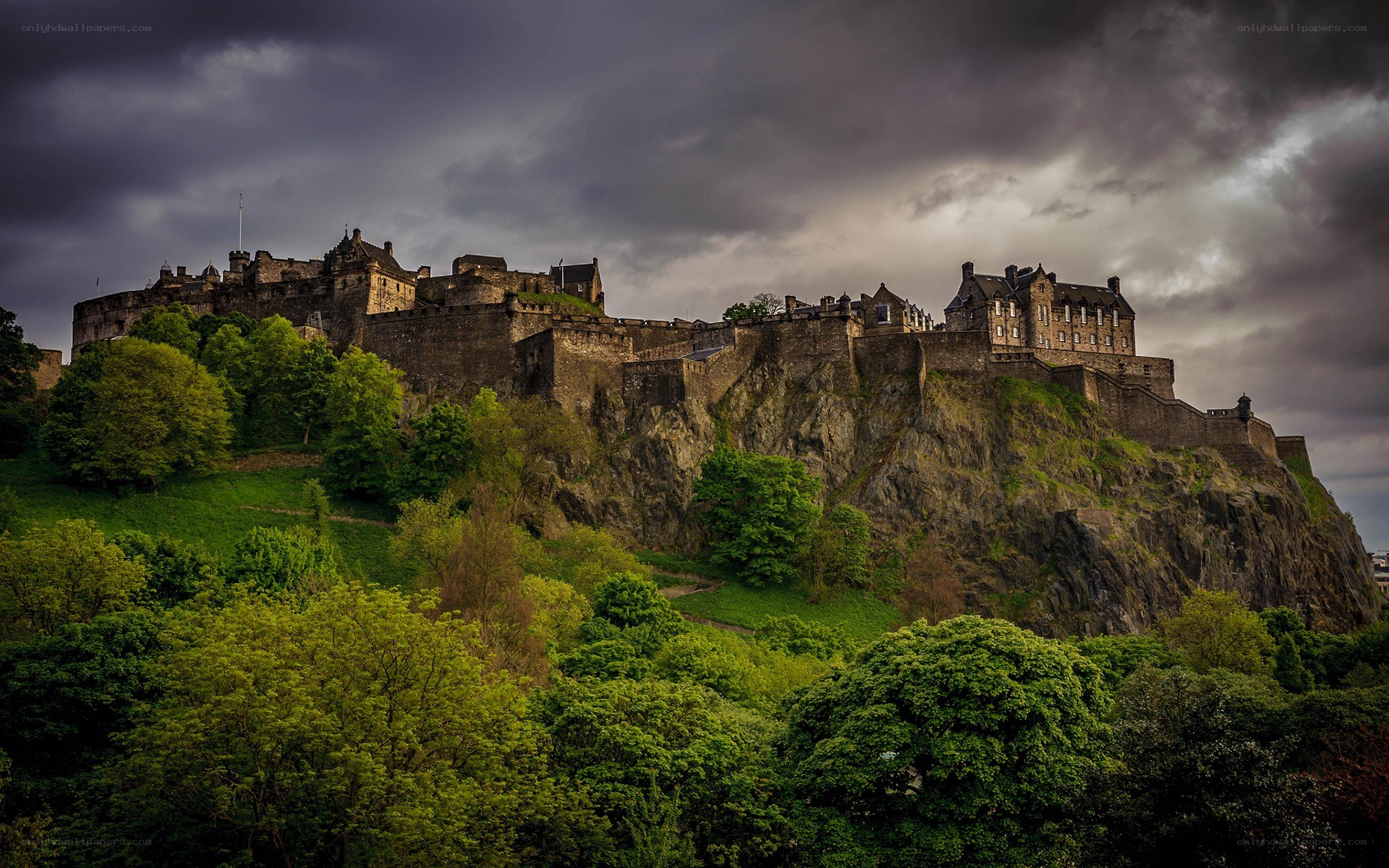 Edinburgh Castle under stormy sky