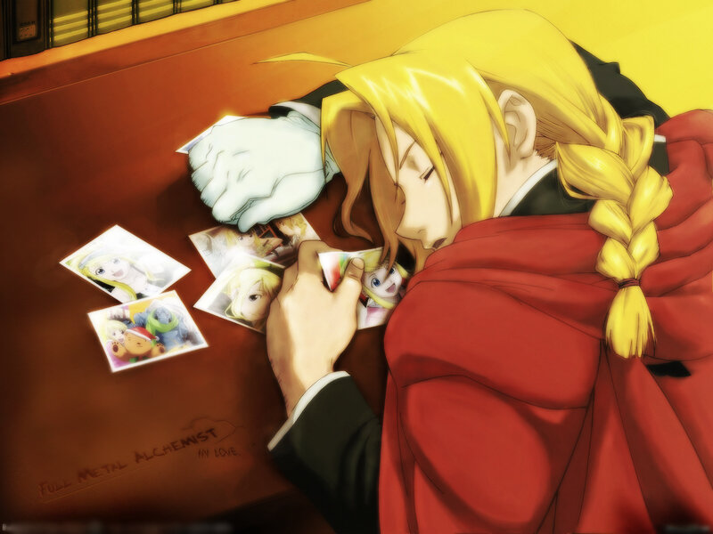 Edward Elric holding photos