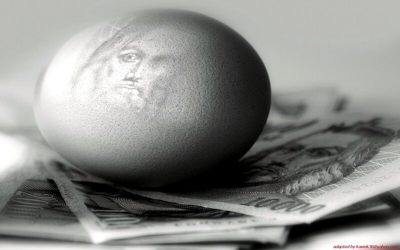 Egg with face on money