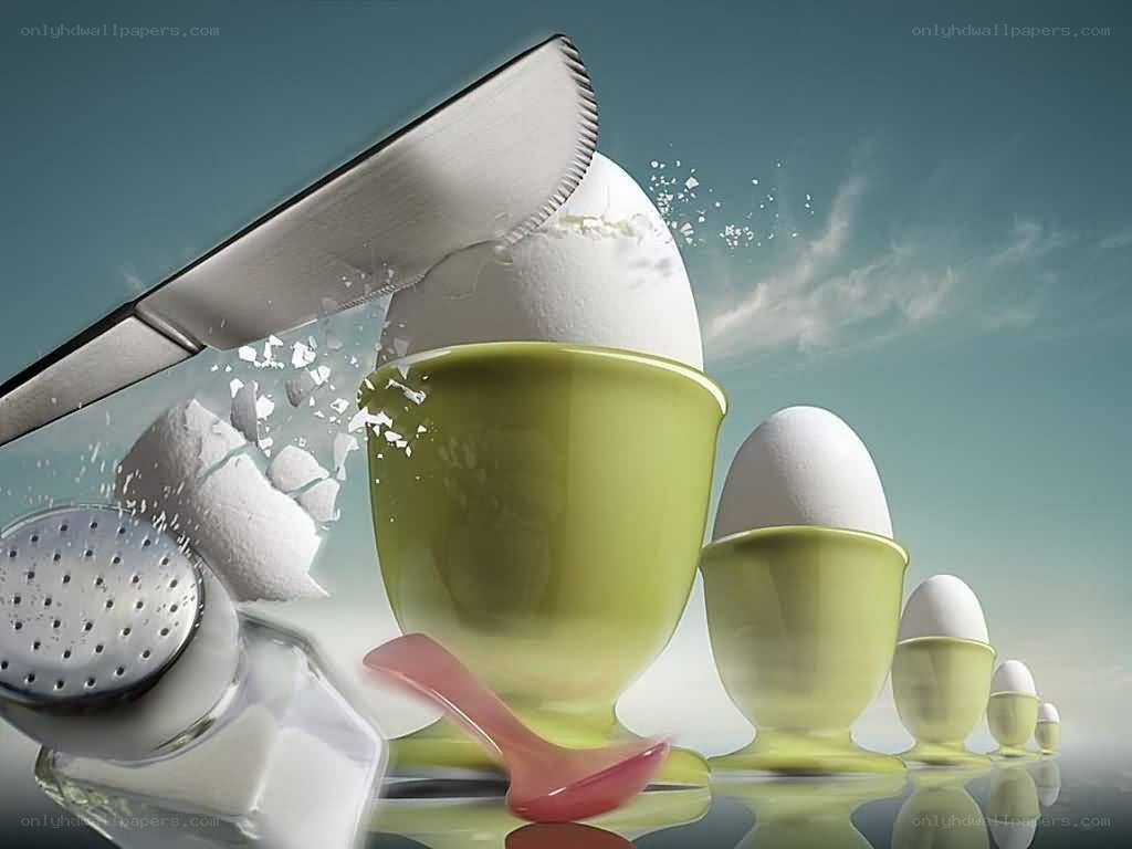 Eggs being cracked with a knife