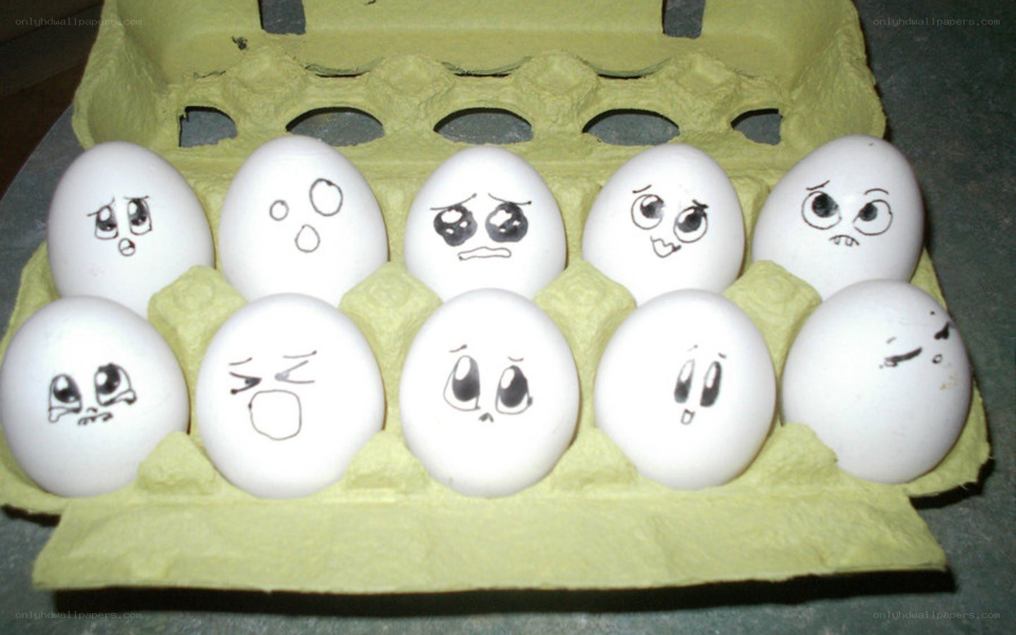 eggs with drawn faces