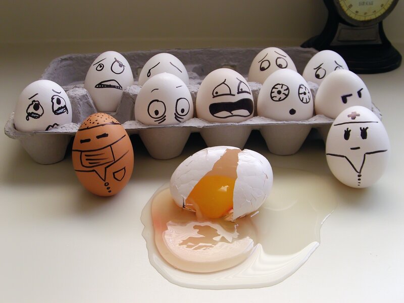 Eggs with Drawn Faces — White, Dramatic