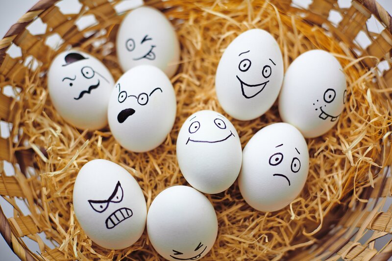 Eggs with Faces in Basket