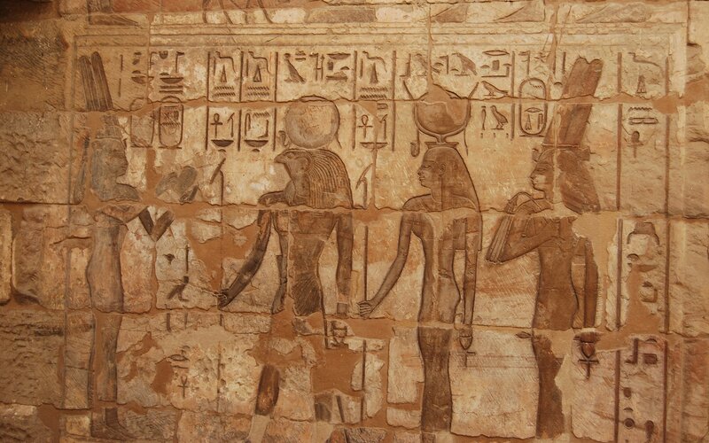 Egyptian hieroglyphs on temple wall