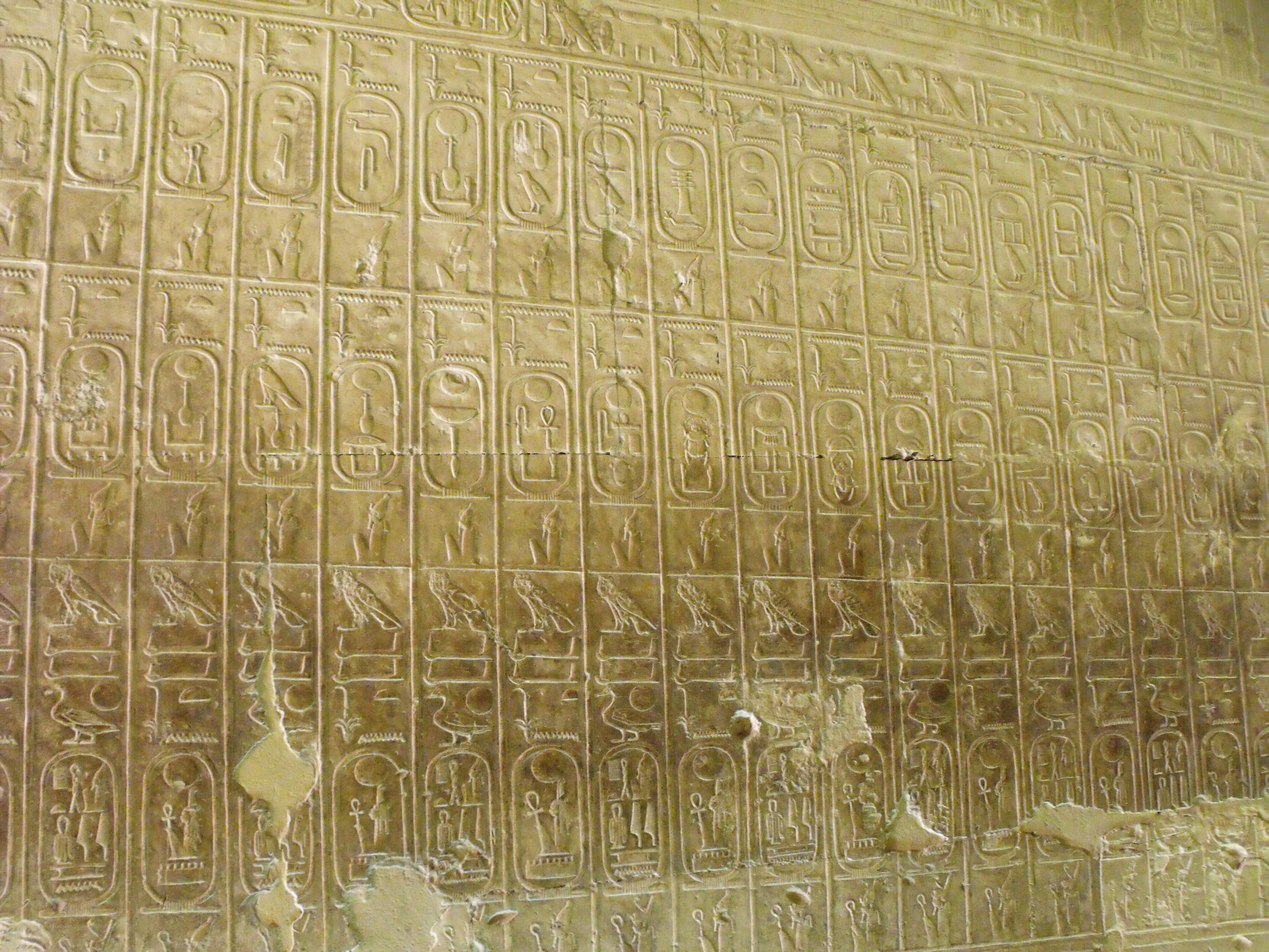 Egyptian hieroglyphs on temple wall