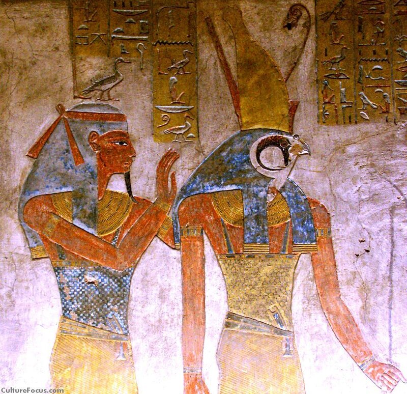 Egyptian wall painting of pharaoh and god