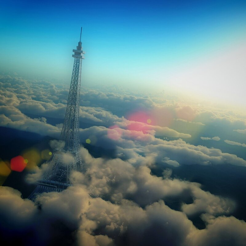 Eiffel Tower Above Clouds