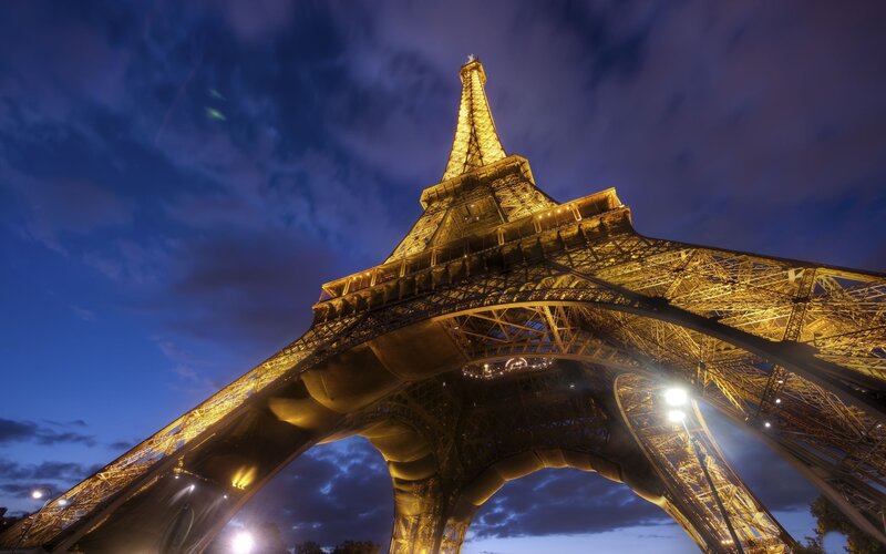 Eiffel Tower at Night — Blue, Dramatic, Photograph, Sky, Clouds, Lights