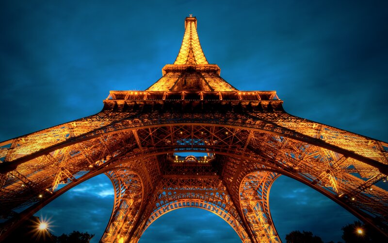 Eiffel Tower at Night — Blue, Dramatic, Photograph, Sky, Lights, Trees