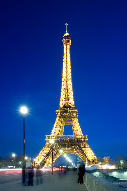 Eiffel Tower at Night — Blue, Dramatic, Photograph, Streetlights